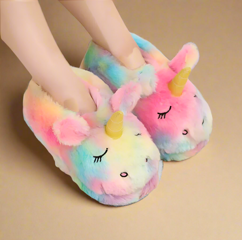 Magical unicorn slippers in soft pastel plush with 3D horn, rainbow mane, and a cozy fit for added warmth