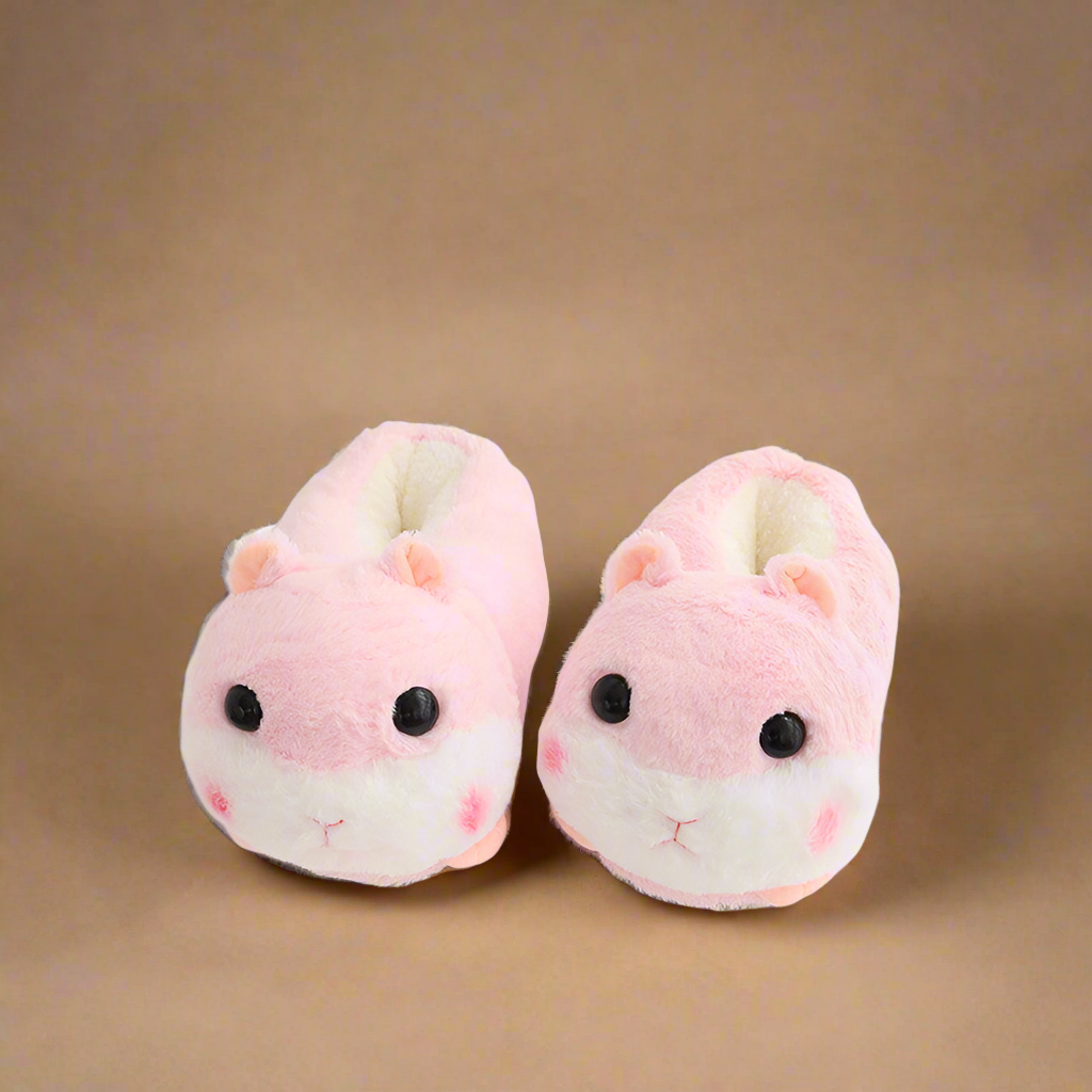 Pink hamster-shaped slippers with fluffy plush fabric, 3D ears, and an adorable face, crafted for warmth and comfort.